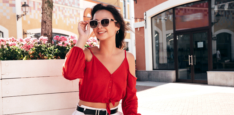 Stylish woman wearing sunglasses during spring
