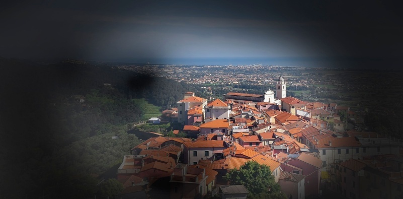 A visual example of vision loss with glaucoma, showing a loss of peripheral vision when looking at a town in the distance.